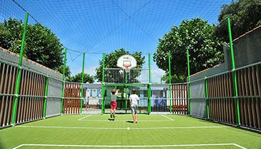Football and basketball on the multi-sport field of the campsite at Saint-Hilaire de Riez