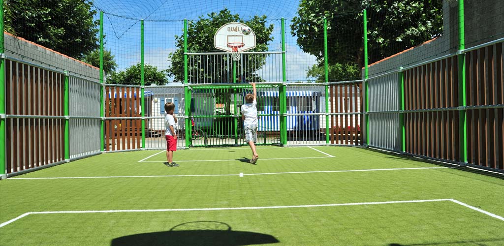 Football and basketball on the multi-sport field of the campsite at Saint-Hilaire de Riez